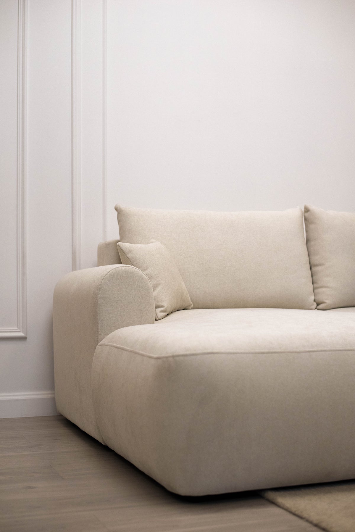 Canapé d'angle avec fonction couchage Ovo mini en L, côté gauche, avec rangement, en chenille crème facile à nettoyer