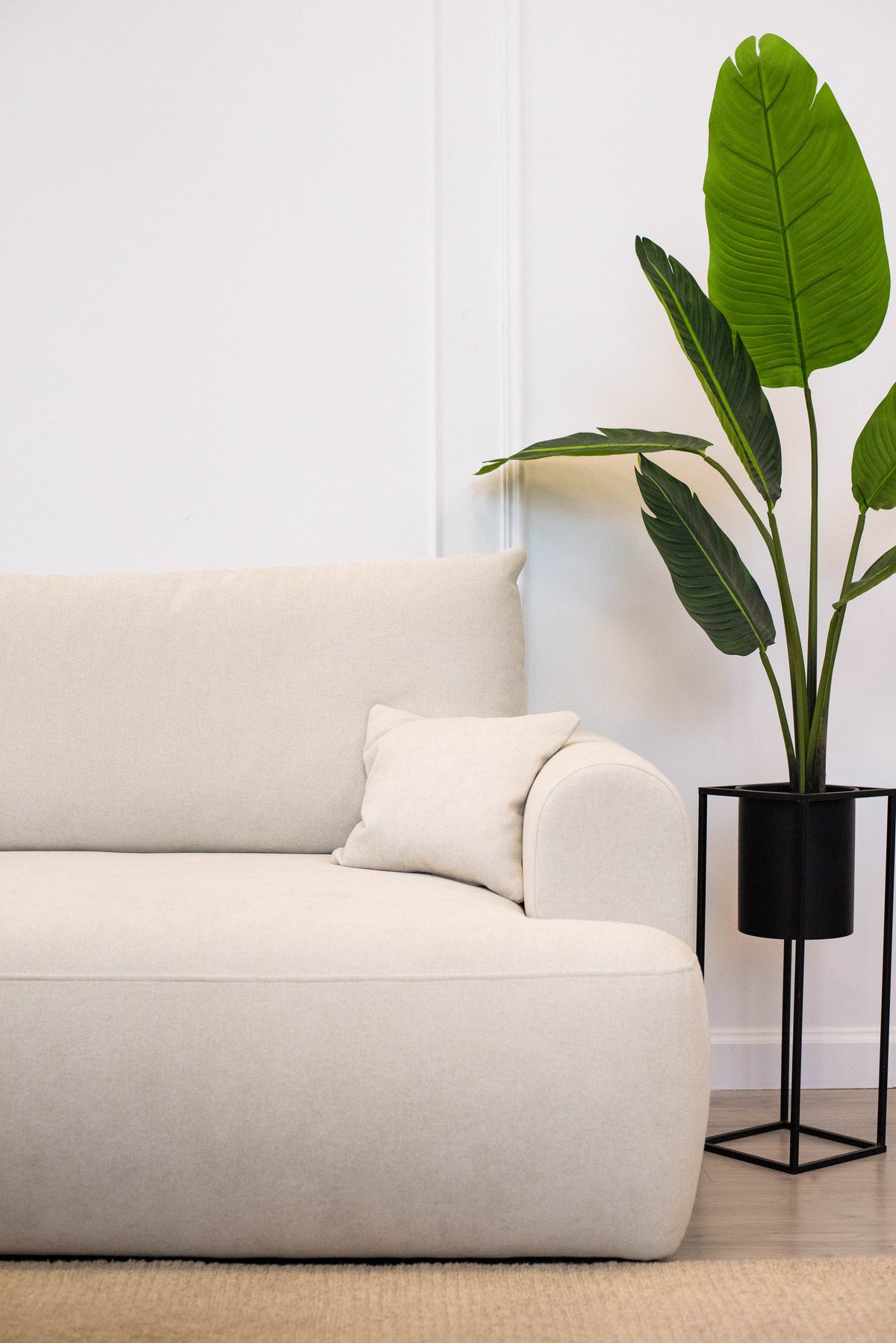 Canapé d'angle avec fonction couchage Ovo mini en L, côté gauche, avec rangement, en chenille crème facile à nettoyer