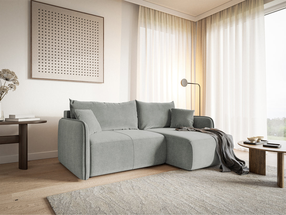 Canapé d'angle convertible Mavio en velours hydrofuge gris clair avec coffre de rangement, modèle universel en L