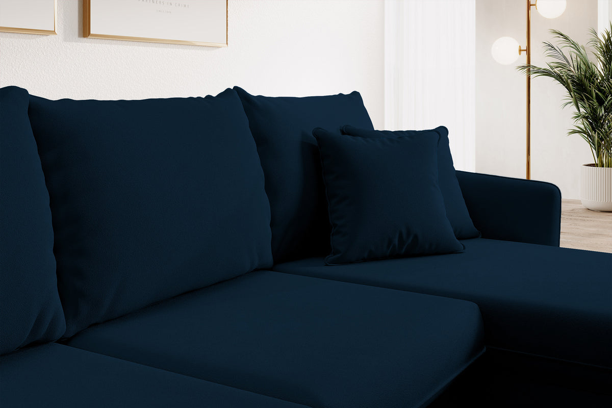 Canapé d'angle Volio en velours hydrofuge bleu marine avec fonction couchage, pieds dorés