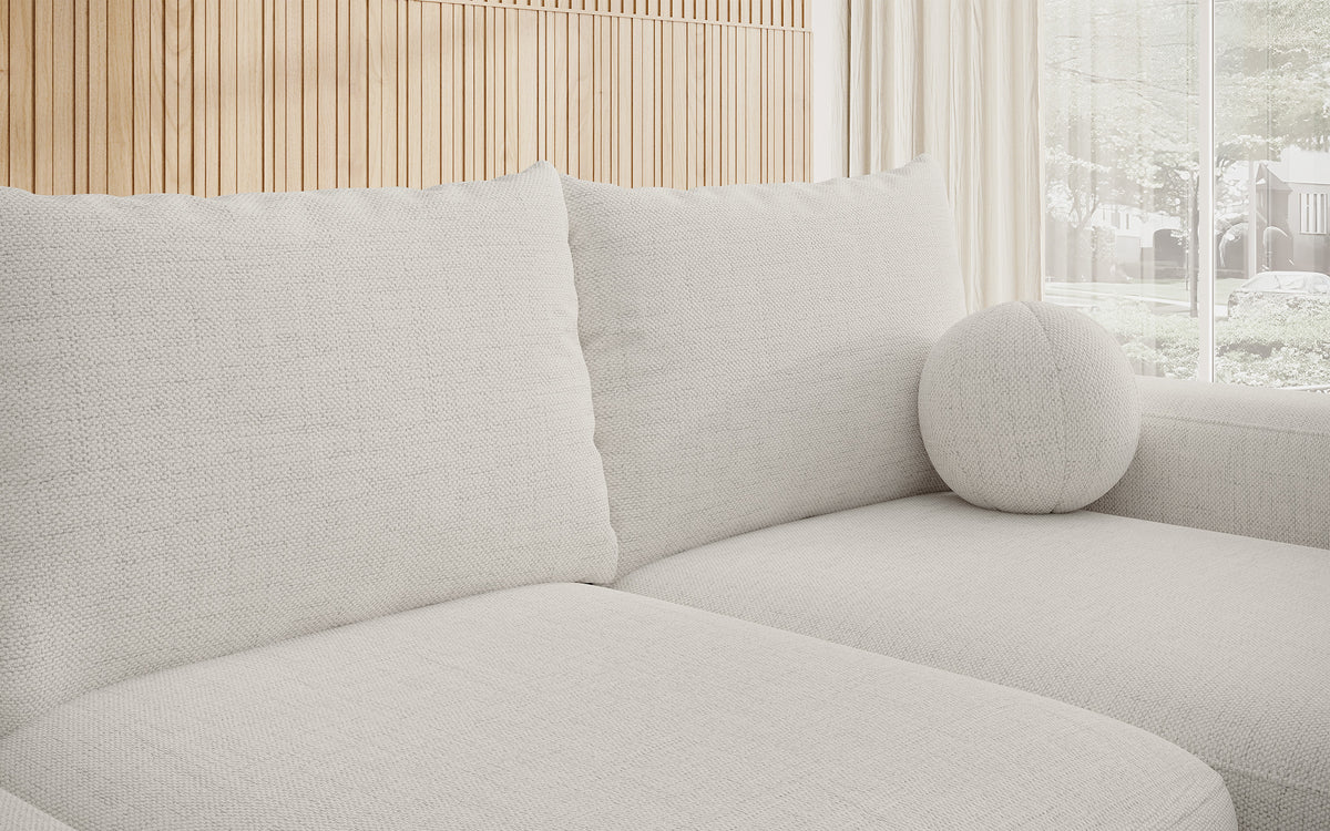 Canapé d'angle Carnos avec fonction couchage, forme en L, avec coussin boule, coussins simples en chenille crème, orientation droite