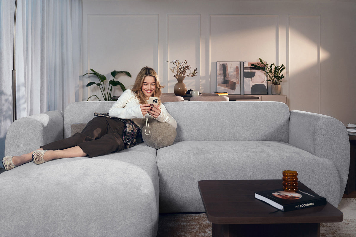 Canapé d'angle gauche Emia avec fonction couchage, tissu chenille gris