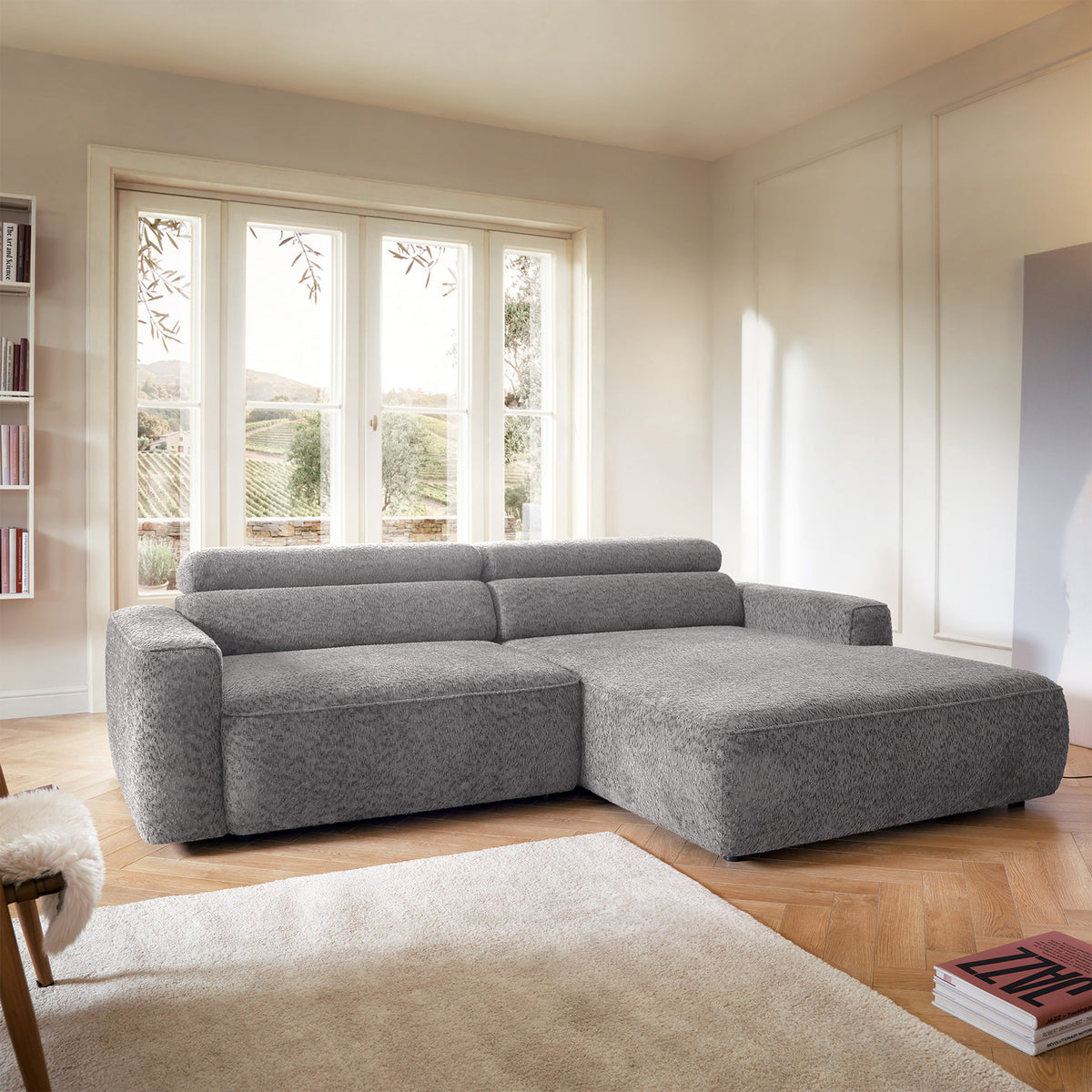 Canapé d'angle Fando avec assise électrique coulissante, en L, côté droit, tissu chenille gris clair