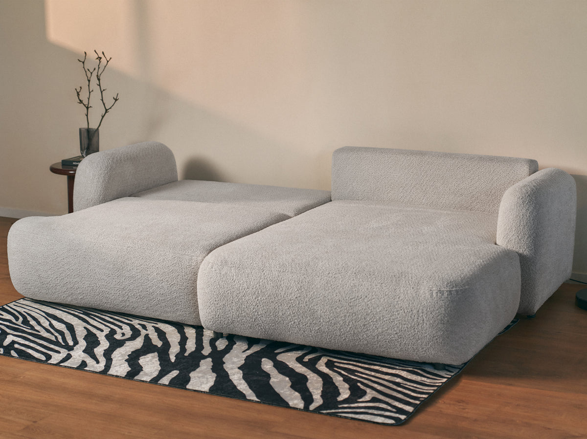 Canapé d'angle Tvoya en forme de L, droit, boucle gris clair avec fonction couchage