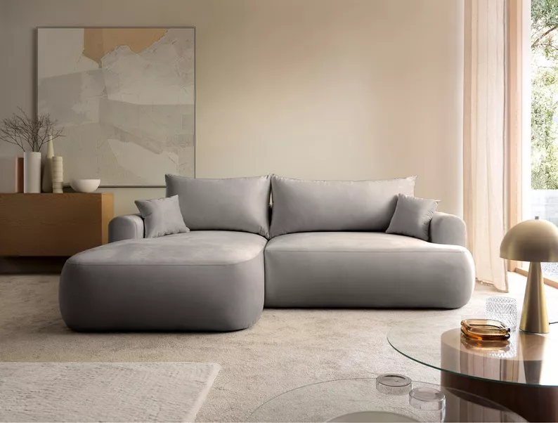 Jasnoszary narożnik Ovo lewostronny z funkcją spania i pojemnikiem na pościel.