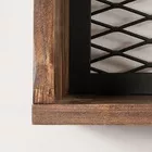 Un ensemble de trois étagères murales Butzi dans un style industriel