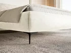 Łóżko tapicerowane 180x200 cm Roule z pojemnikiem stelaż metalowy kremowe szenil nóżki czarne